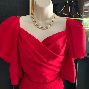 Beautiful Red blouse. Elegant and affordable. Size S.  Machine washable.